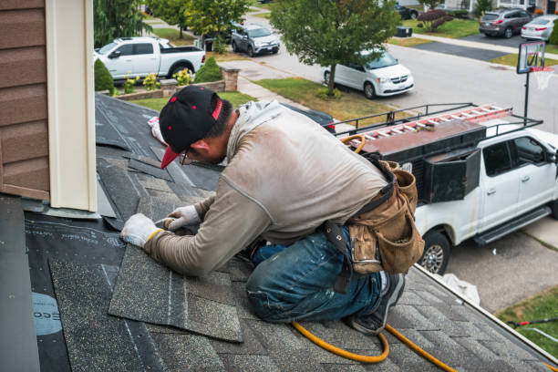 Professional Storm Damage Roof Repair technician working in Sandy Hook, CT